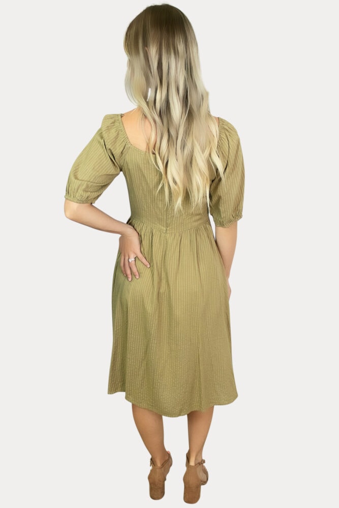Our striped button down maternity dress in olive is sure to add a subtle elegance to your mama wardrobe!