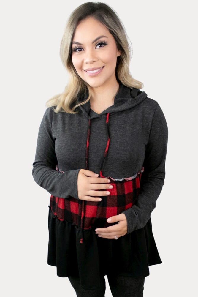 An adorable buffalo plaid maternity sweatshirt that's both fashionable and comfortable!