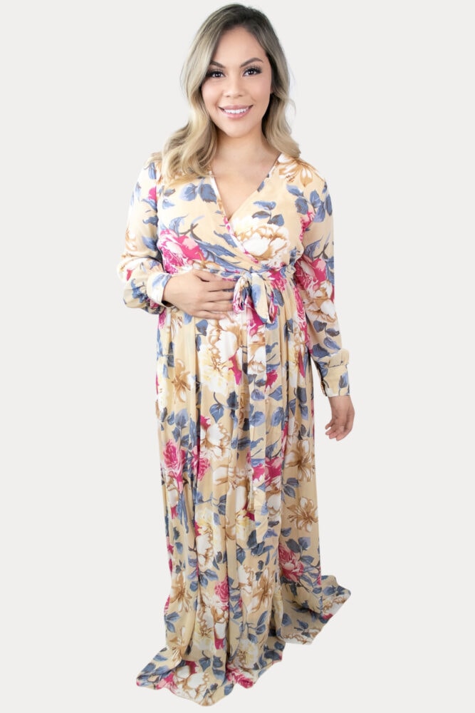 This is the perfect tie-front floral maternity maxi. Features a gorgeous gentle tan, with a standout large floral print.