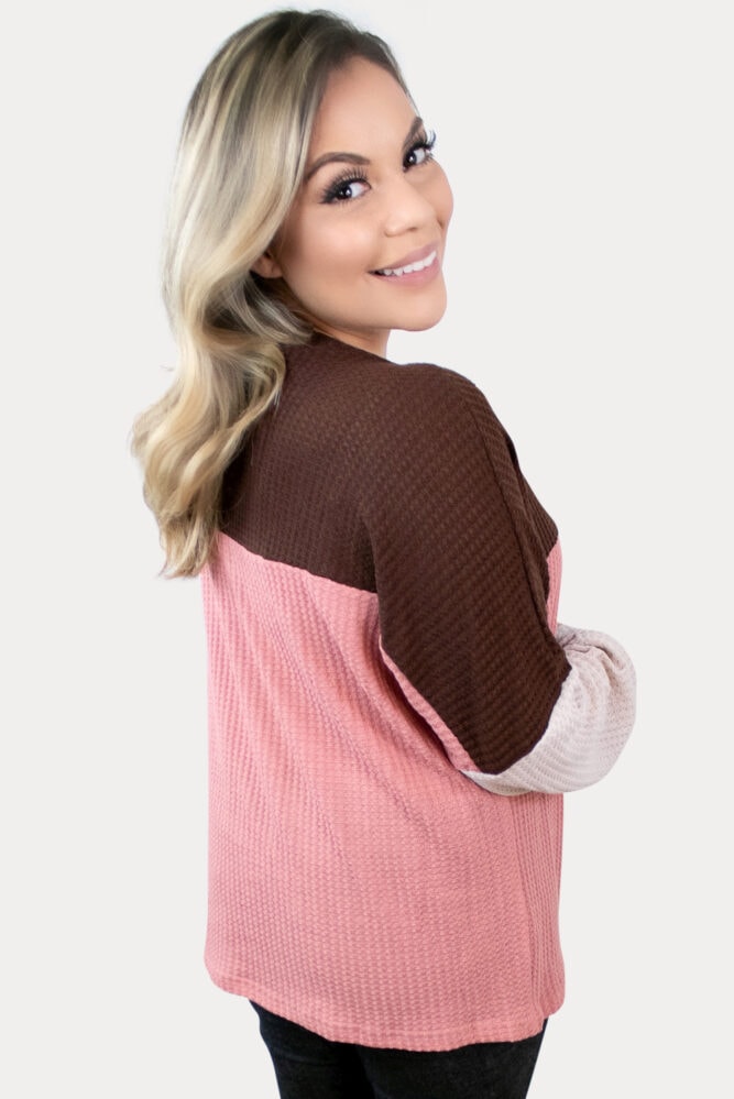 Fun, and cozy, this waffle knit maternity top is sure to keep you comfy.